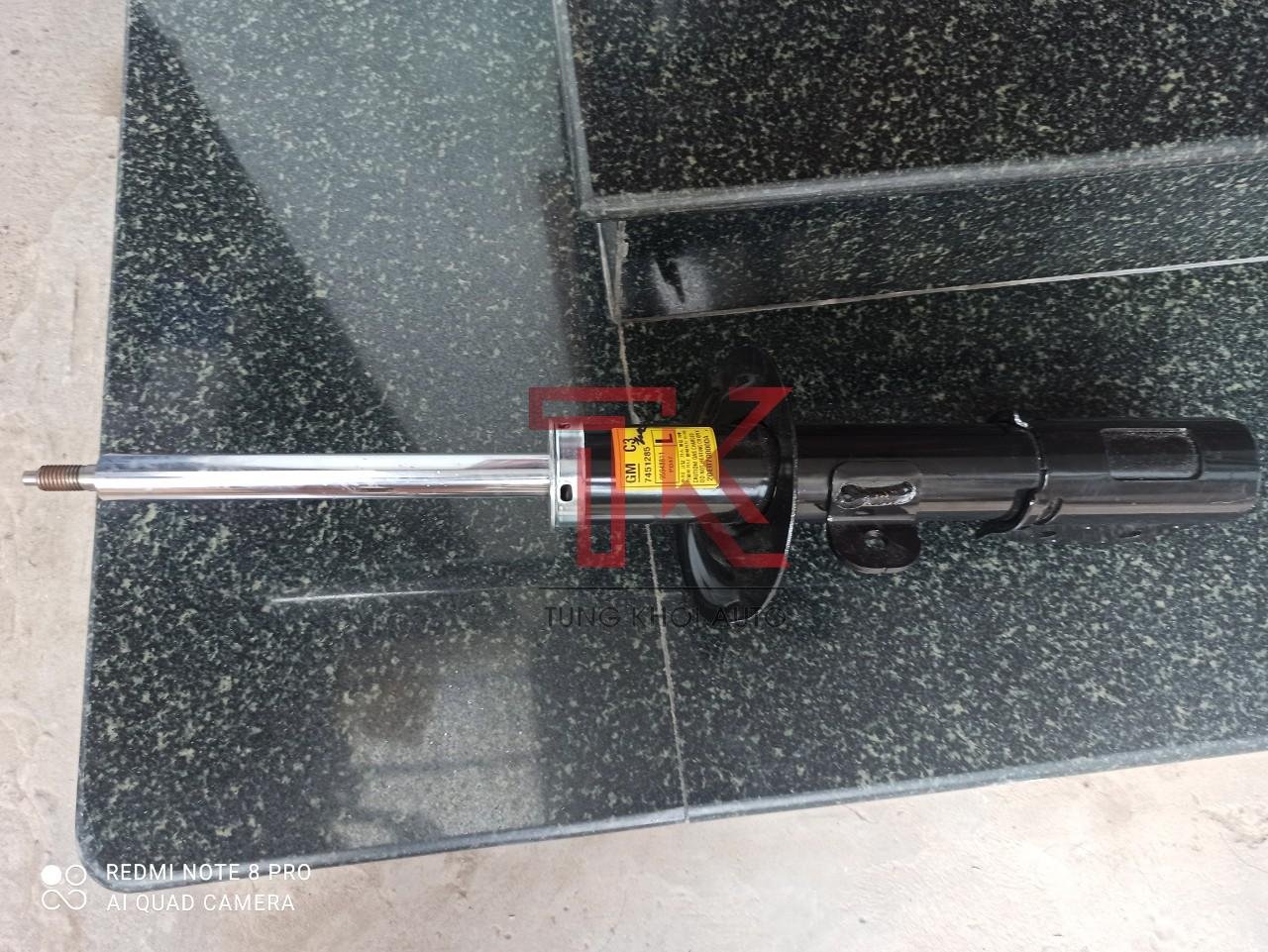 z2443109369503_6a6b6d1c45a54c5be815aa44f5eeba48 GIẢM XÓC TRƯỚC TRÁI CHEVROLET CAPTIVA